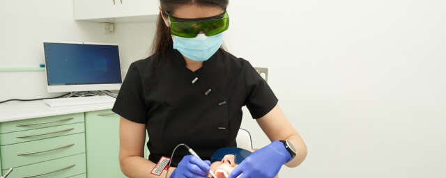 dentist carrying out general dentistry to a patient at progressive dentistry