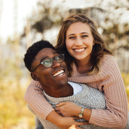 a young couple smiling
