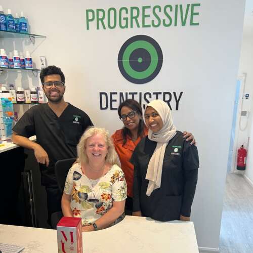 dental team at progressive dentistry celebrating