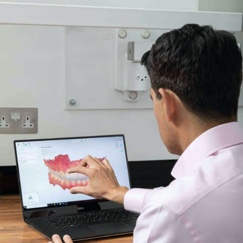 Dr patel with laptop