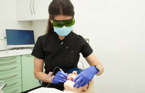 dentist carrying out general dentistry to a patient at progressive dentistry