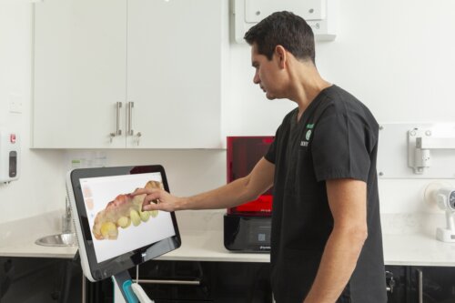 Dr Patel with oral scanner