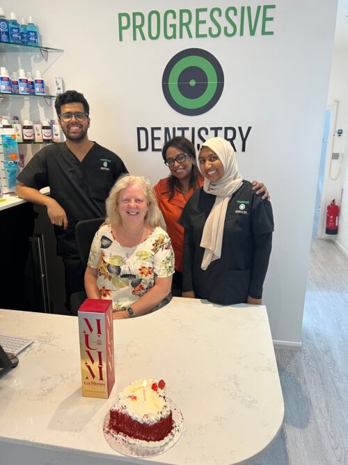 Dental team at progressive dentistry celebrating