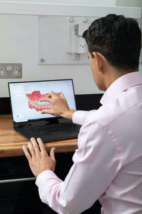 Dr patel with laptop