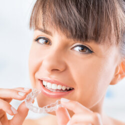 Girl smiling after smile transformation treatment close up