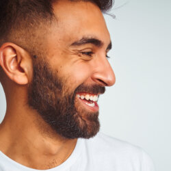 Man smiling after composite bonding treatment close up